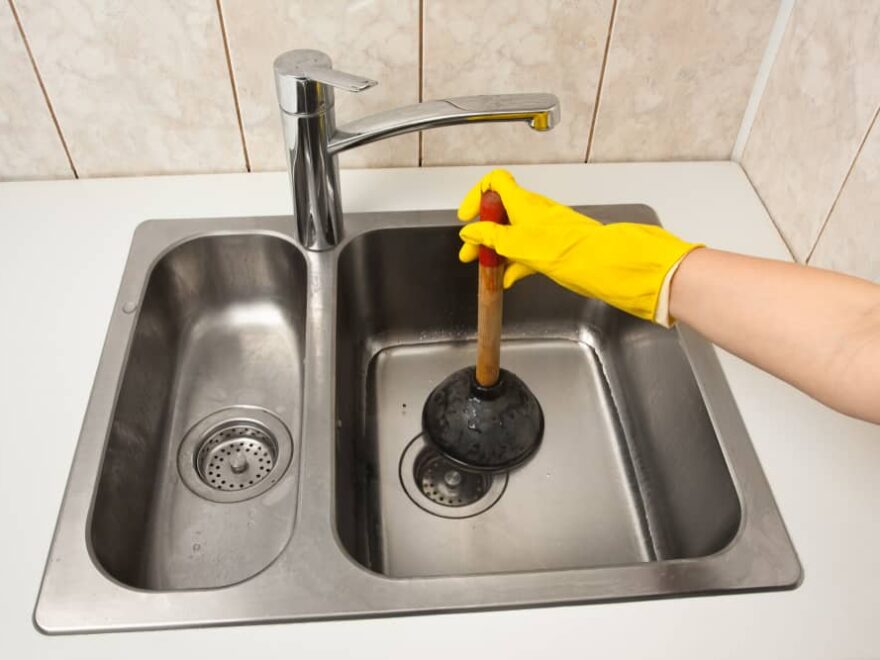 how to unclog a kitchen sink with standing water