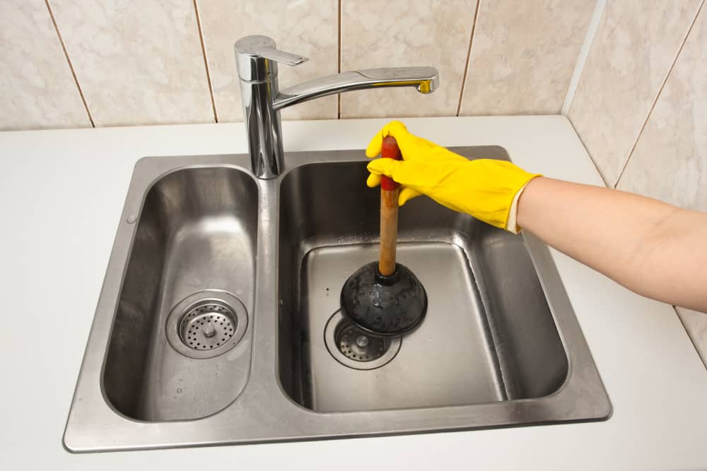 how to unclog a kitchen sink with standing water