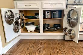 how to organize pots and pans in kitchen cabinets